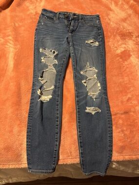 American Eagle Ripped Blue Super High-Rise Jeggings